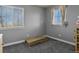 Bedroom with light walls, carpet flooring, and a window letting in natural light at 5285 La Quinta Cir, Elizabeth, CO 80107