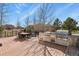Outdoor deck featuring outdoor kitchen, dining table, BBQ and an open view at 5285 La Quinta Cir, Elizabeth, CO 80107