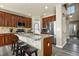 Functional kitchen island with granite countertops and bar stool seating at 5285 La Quinta Cir, Elizabeth, CO 80107