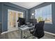 Comfortable home office featuring natural light and stylish French doors at 5285 La Quinta Cir, Elizabeth, CO 80107