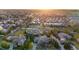 An aerial view showcases the Tudor-style home, located in a leafy neighborhood close to walking paths at 35 Brookhaven Ln, Littleton, CO 80123