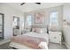 Inviting bedroom featuring a cozy bed, stylish nightstands, and serene decor at 6361 Kenzie Cir, Castle Pines, CO 80108
