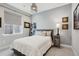 Cozy bedroom features a comfortable bed, natural light, and stylish decor at 6361 Kenzie Cir, Castle Pines, CO 80108