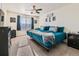 Bedroom with plush carpeting, ceiling fan, and dual beds with comfortable bedding at 2300 Mountain Sky Dr, Fort Lupton, CO 80621