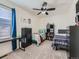 Bedroom with two twin beds and a desk at 2300 Mountain Sky Dr, Fort Lupton, CO 80621