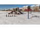 Community playground in the snow at 2300 Mountain Sky Dr, Fort Lupton, CO 80621