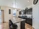 Modern kitchen with granite countertops and stainless steel appliances at 2300 Mountain Sky Dr, Fort Lupton, CO 80621