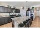 Spacious kitchen with an island and plenty of cabinet space at 2300 Mountain Sky Dr, Fort Lupton, CO 80621