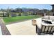 Relaxing patio with comfortable seating and a stylish fire pit, perfect for enjoying the outdoors at 2300 Mountain Sky Dr, Fort Lupton, CO 80621