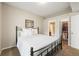 Bright bedroom featuring a comfortable bed and an adjoining en-suite bathroom and walk-in closet at 7452 Singing Hills Dr, Boulder, CO 80301