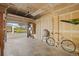 An open garage reveals storage shelves and a bicycle at 7452 Singing Hills Dr, Boulder, CO 80301