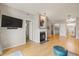 Spacious living room with hardwood floors, fireplace, and modern decor at 7452 Singing Hills Dr, Boulder, CO 80301