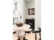 Modern dining area with round table and four chairs at 8280 E 36Th Ave # 28, Denver, CO 80238