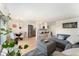 Spacious living area with a view of the dining area and kitchen, offering an open layout at 1350 Josephine St # 307, Denver, CO 80206