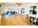 Bright living room features hardwood floors, neutral decor, and ample natural light at 10130 W 20Th Ave, Lakewood, CO 80215