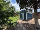 Backyard storage shed offers practical storage in a landscaped garden setting at 10130 W 20Th Ave, Lakewood, CO 80215
