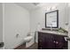 Modern bathroom with a vanity, granite countertop, and updated fixtures at 1011 Pierce St # 11, Lakewood, CO 80214