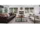 Cozy living room with fireplace, ample natural light, and stylish furnishings with comfortable seating at 1011 Pierce St # 11, Lakewood, CO 80214