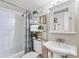 Clean bathroom with white vanity and shower/tub combo at 10 N Ogden St # 5, Denver, CO 80218