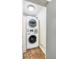 Stackable washer and dryer in a well-lit laundry room at 10 N Ogden St # 5, Denver, CO 80218