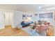Living room with hardwood floors and a cozy atmosphere at 10 N Ogden St # 5, Denver, CO 80218