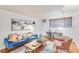Bright living room featuring hardwood floors and comfy furniture at 10 N Ogden St # 5, Denver, CO 80218