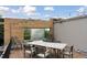 Rooftop deck with dining table and chairs at 10 N Ogden St # 5, Denver, CO 80218