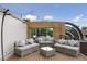Spacious rooftop deck with seating and city views at 10 N Ogden St # 5, Denver, CO 80218