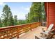 Wooden deck offers amazing forest and mountain views at 489 Harris Dr, Idaho Springs, CO 80452