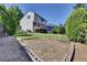 Spacious backyard with wooden deck and garden plot at 15941 Bluebonnet Dr, Parker, CO 80134