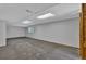Spacious basement with drop ceiling and carpet at 15941 Bluebonnet Dr, Parker, CO 80134