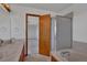 Bathroom with dual sinks, tub and shower combination behind glass doors at 15941 Bluebonnet Dr, Parker, CO 80134