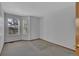 Bright bedroom with neutral walls, trim and carpet, plus a window at 15941 Bluebonnet Dr, Parker, CO 80134
