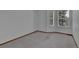 Spacious bedroom with neutral carpeting and plenty of natural light from the windows at 15941 Bluebonnet Dr, Parker, CO 80134