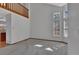 Spacious living room with high ceilings and many large windows offering an abundance of natural light at 15941 Bluebonnet Dr, Parker, CO 80134