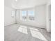 Light-filled bedroom features two windows and plush carpet at 18958 E 94Th Pl, Commerce City, CO 80022