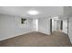 Spacious basement featuring neutral carpet and paint with ample room for relaxing or entertaining at 9227 W 67Th Ave, Arvada, CO 80004