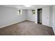 Cozy bedroom with two windows and a closet offering plenty of space and natural light at 9227 W 67Th Ave, Arvada, CO 80004