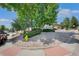 Well manicured front yard featuring mature trees and a yellow fire hydrant at 9227 W 67Th Ave, Arvada, CO 80004