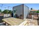 Spacious rooftop deck with seating, string lights, and a shaded lounge area for outdoor enjoyment at 2524 Champa St # 4, Denver, CO 80205