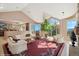 Bright living room features large windows with views, neutral palette, and architectural details at 1682 Montane E Dr, Golden, CO 80401