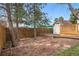 Backyard area featuring a wooden shed and patio with wood and paver accents at 11950 E Exposition Ave, Aurora, CO 80012