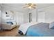 Serene bedroom offers neutral colors, plush carpeting, and ample closet space at 11950 E Exposition Ave, Aurora, CO 80012