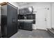 Well-organized garage with cabinets and a workbench at 11950 E Exposition Ave, Aurora, CO 80012