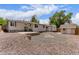Backyard with a patio, storage shed, and minimal landscaping, offering a blank canvas at 3501 W 53Rd Ave, Denver, CO 80221