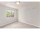 Bright bedroom with a large window, inviting natural light and enhancing the serene atmosphere at 3501 W 53Rd Ave, Denver, CO 80221
