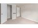 Bedroom featuring an open closet with shelf, plus dual entryways for ease and convenience at 3501 W 53Rd Ave, Denver, CO 80221