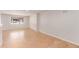 Bright living room showcasing hardwood floors and a large window, providing plenty of natural light at 3501 W 53Rd Ave, Denver, CO 80221