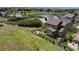 Aerial shot of a cozy backyard with a firepit, and a wooden fence, perfect for outdoor gatherings and relaxation at 2815 Dreamcatcher Loop, Castle Rock, CO 80109