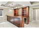 Finished basement with a beautiful wooden bar, decorative lighting, and a built-in wine cooler, perfect for entertaining at 2815 Dreamcatcher Loop, Castle Rock, CO 80109